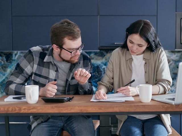 A couple discussing their finances together